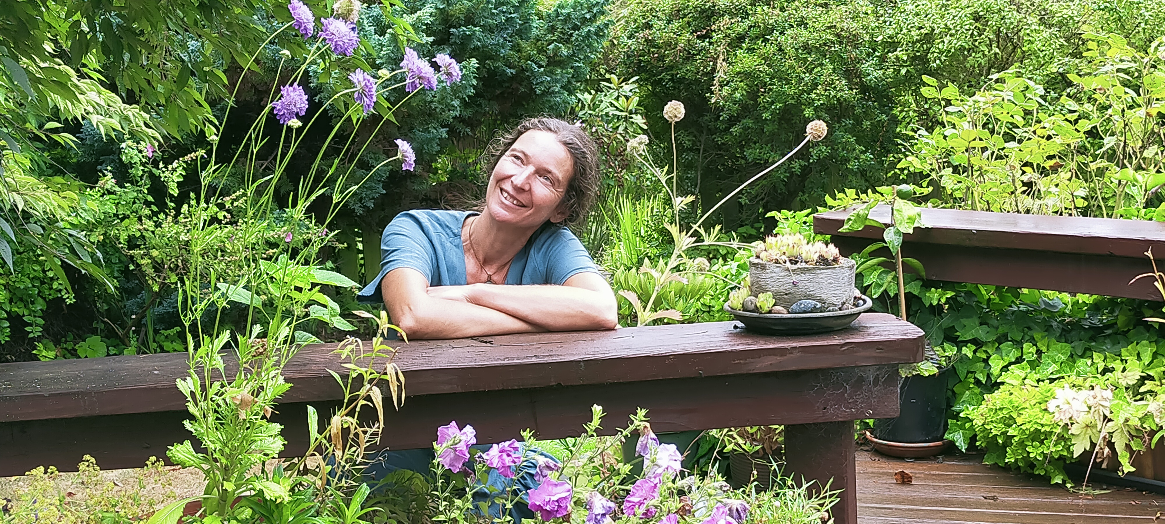 Florence Micoud happy relaxing after a Beautiful Garden of Wanaka guided tour